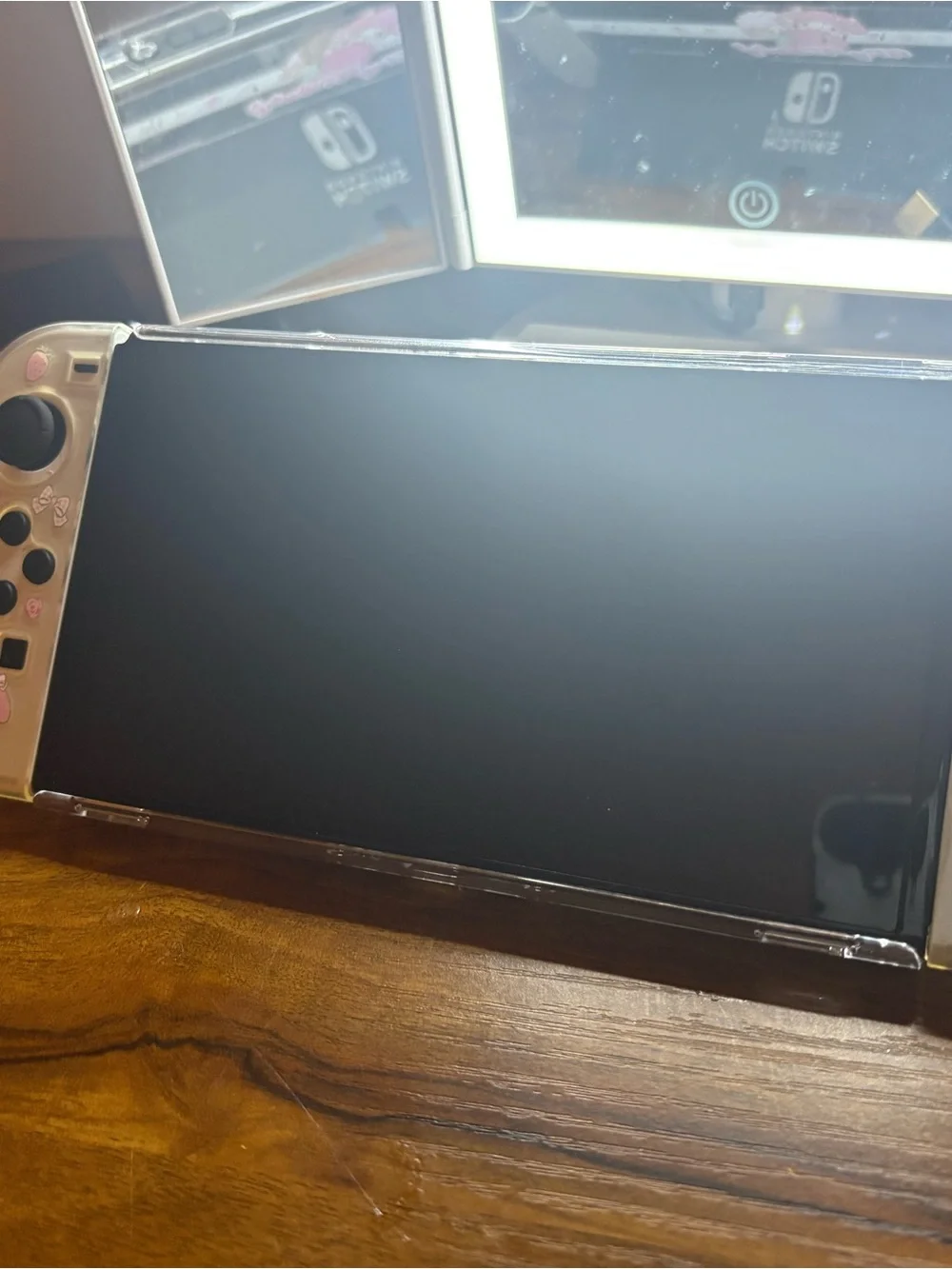 Nintendo Switch Handheld Console with Pink Accent Joy-Con Covers